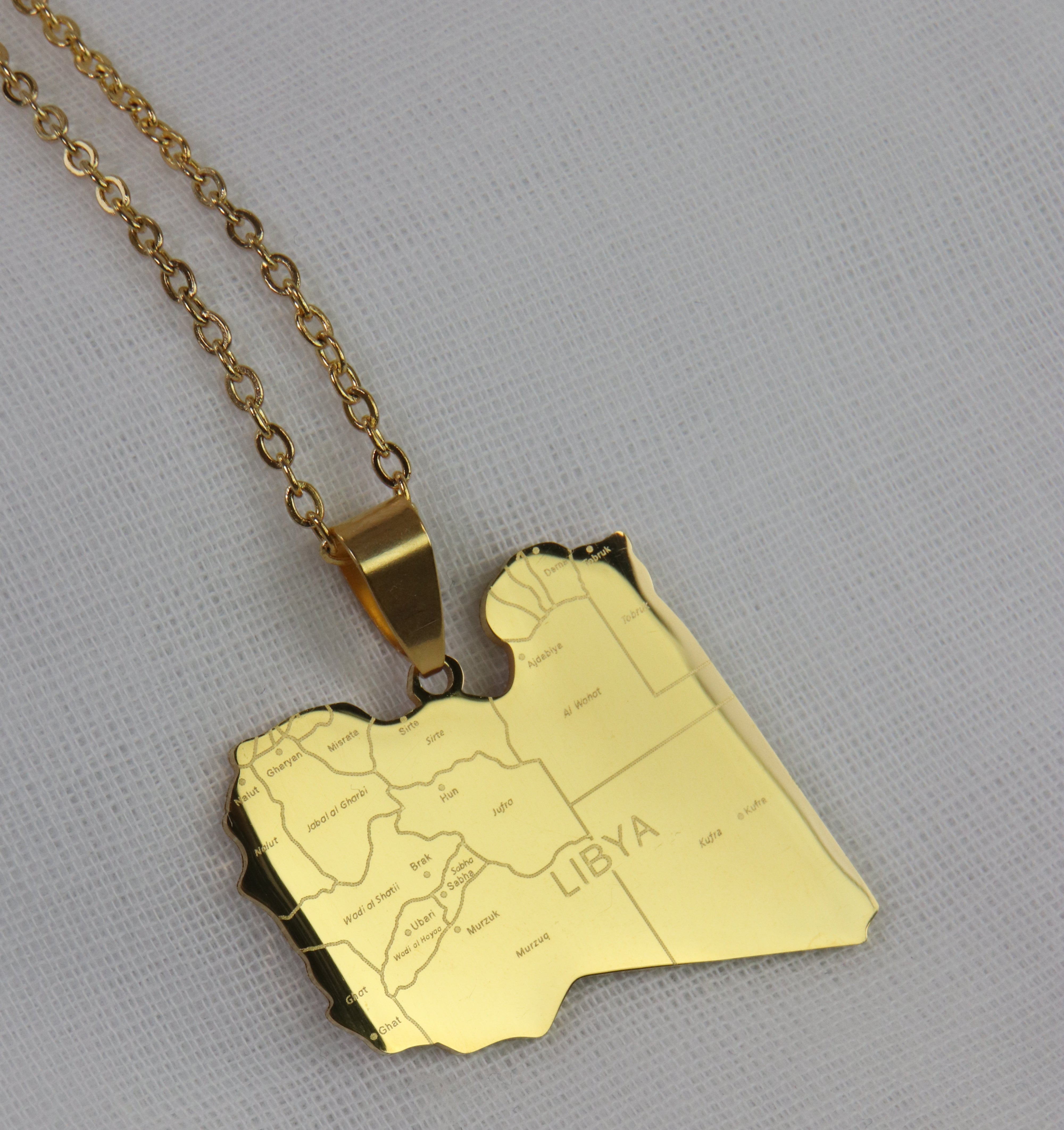 Gold necklace with a Libya map pendant 
